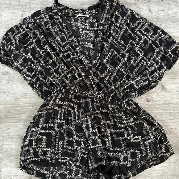 Shop Neighbor Black Romper - Picture 1 of 3